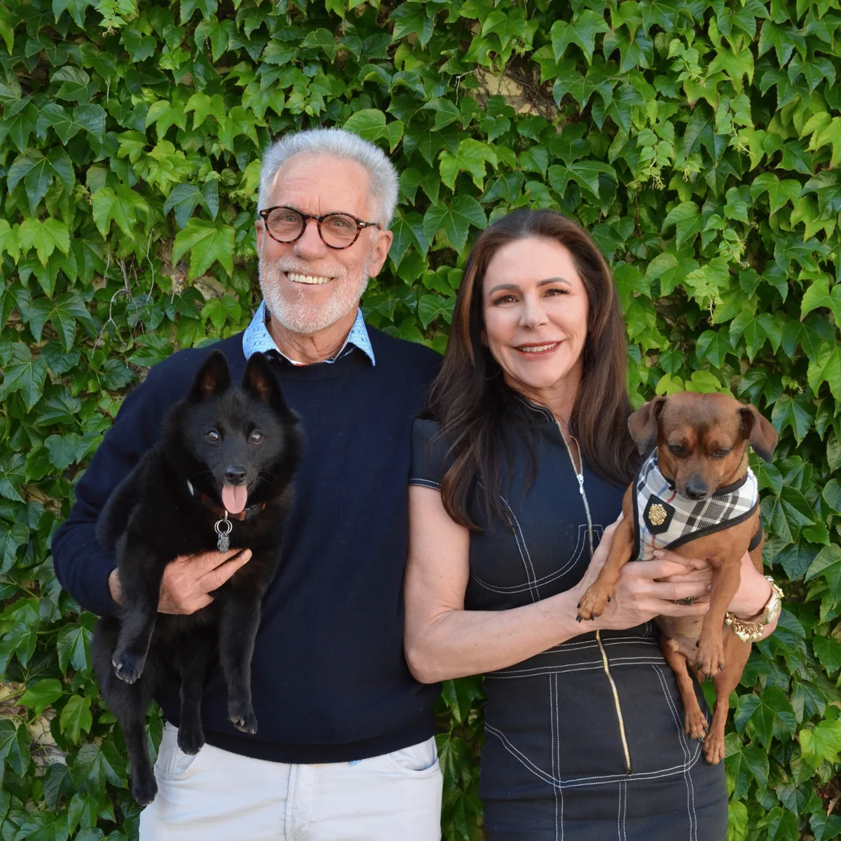 Michele Hall-Preston and David Lindquist, founders of Third Street Counseling, with therapy dogs Paix and Luz